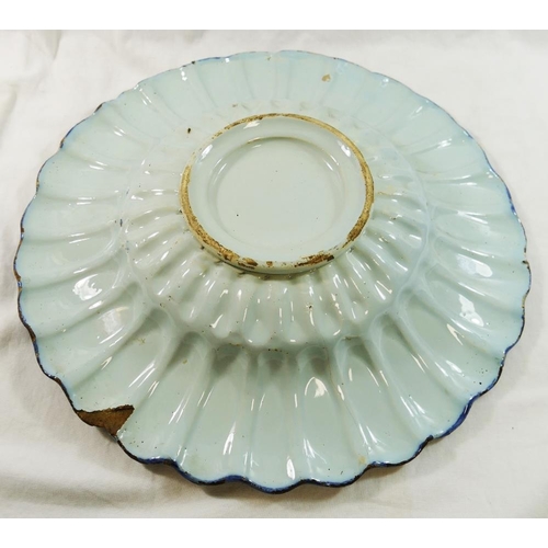 5 - A 19th century Dutch Delft dish, with gadrooned rim, 35cm diameter