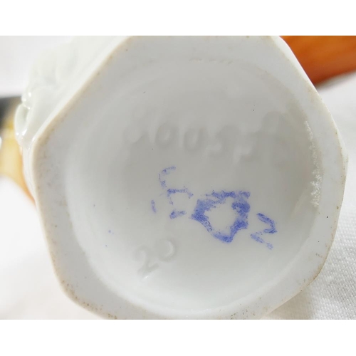 4 - A collection of ceramic bird figures and groups including a Royal Worcester porcelain bird group ent... 