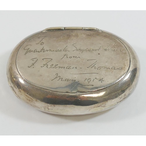 121 - An Edwardian oval silver 'squeeze' tobacco box, Birmingham 1901, with inscription; 'To Quartermaster... 