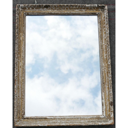 77 - A 19th century rectangular giltwood framed wall mirror, the frame surmounted with rectangular pedime... 