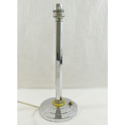 85 - An Art Deco chrome plated table lamp, the hexagonal stem mounted to a Bakelite disc above a circular... 