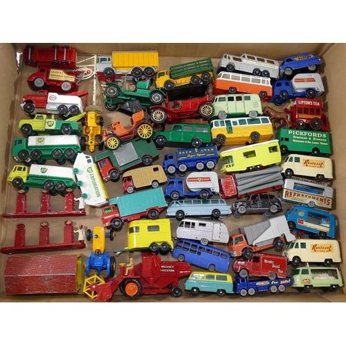 116 - A collection of 120+ assorted mainly Matchbox vehicles, including Esso fuel pumps, a garage and tow ... 