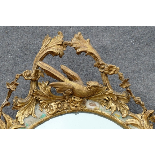 133 - A pair of 19th century circular girandole mirrors, the twin branches each with two lights, the giltw... 