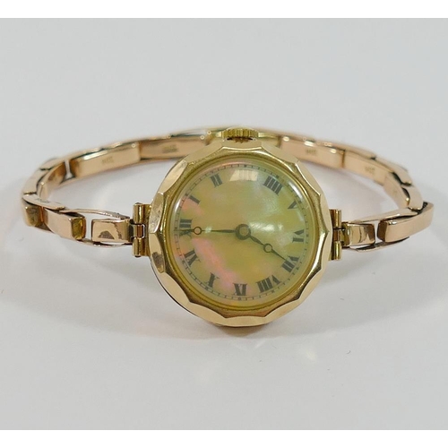 148 - A 9 carat gold cased ladies bracelet watch, with expanding strap marked '9CT', 18.5g gross, boxed