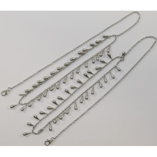 169 - A collection of silver coloured metal jewellery stamped '925' comprised of three necklaces including... 