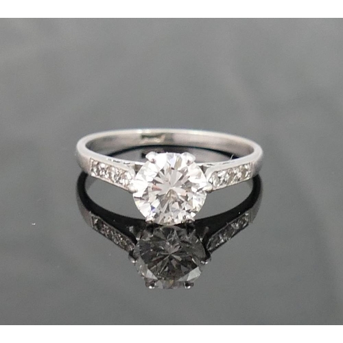 197 - A diamond single stone ring, the round brilliant cut stone approximately 1.23 carats, with visible i... 