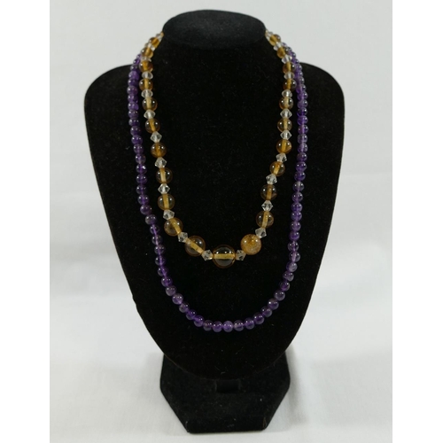 207 - A collection of amethyst and citrine set  jewellery, the amethyst jewellery comprised a faceted bead... 