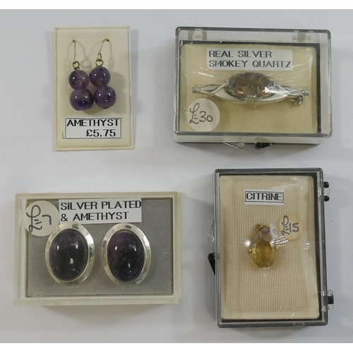 207 - A collection of amethyst and citrine set  jewellery, the amethyst jewellery comprised a faceted bead... 