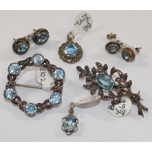 219 - A selection of blue topaz set jewellery including marcasite set examples, comprised of a circular br... 