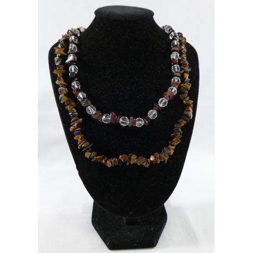 223 - A selection of tiger's eye jewellery comprised of a string of pebble beads, with matching bracelet a... 