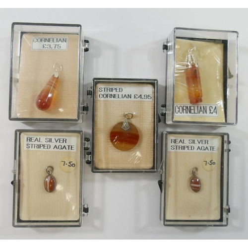 229 - A selection of banded carnelian and other agate jewellery comprised of 11 pendants including two gre... 