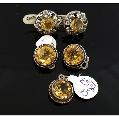 245 - A collection of amethyst and citrine set  jewellery, the amethyst jewellery comprised of a Celtic st... 