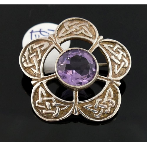 245 - A collection of amethyst and citrine set  jewellery, the amethyst jewellery comprised of a Celtic st... 