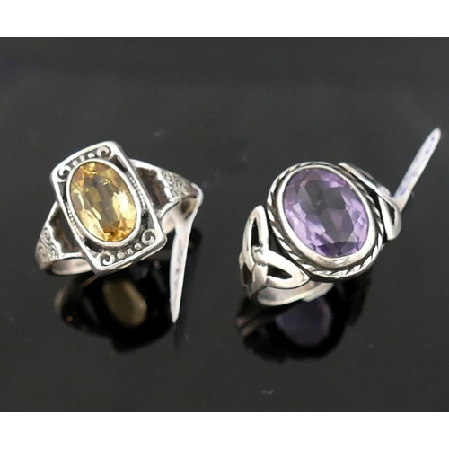 245 - A collection of amethyst and citrine set  jewellery, the amethyst jewellery comprised of a Celtic st... 