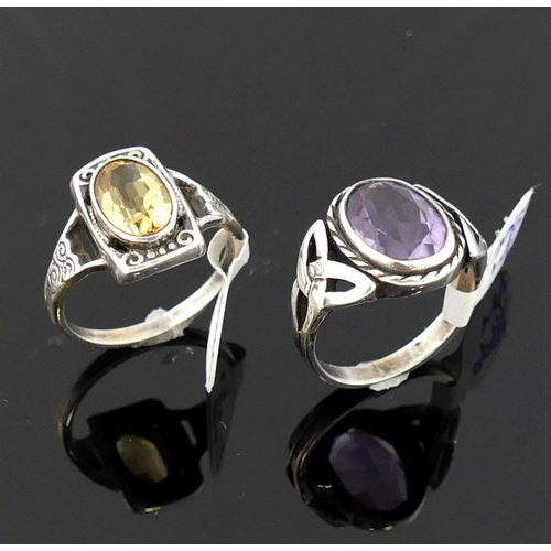 245 - A collection of amethyst and citrine set  jewellery, the amethyst jewellery comprised of a Celtic st... 