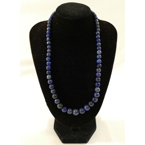 249 - A selection of lapis lazuli jewellery comprised of a graduated bead necklace, 45cm long, a bead brac... 