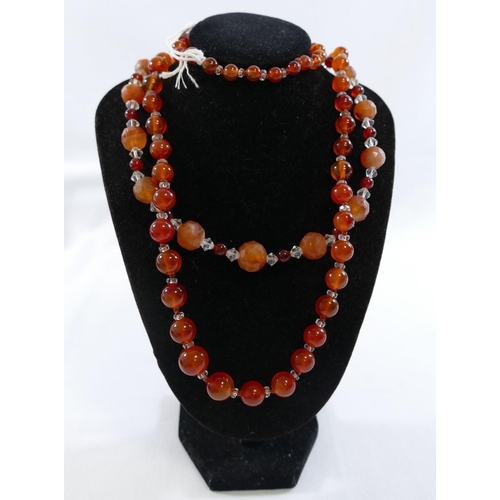 271 - A selection of carnelian and aventurine quartz jewellery comprised of a long string of graduated car... 