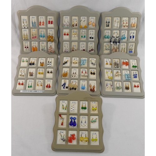 277 - 192 pairs of paste, bead and other mainly drop earrings housed in presentation display stands

We ar... 