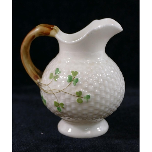 348 - A Belleek second mark basket weave shamrock jug, 10cm high and German Belleek style semi-porcelain s... 