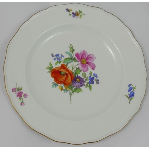 350 - A set of four Meissen style porcelain soup plates, hand painted with floral sprays, with wavy gilt r... 