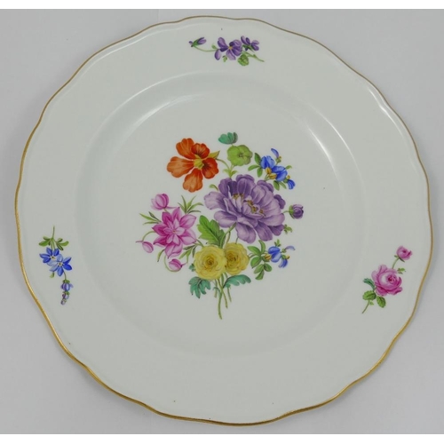 350 - A set of four Meissen style porcelain soup plates, hand painted with floral sprays, with wavy gilt r... 