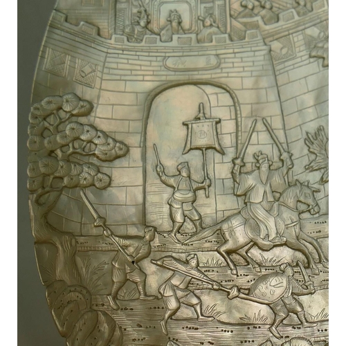 371 - A large Chinese carved mother of pearl shell intricately decorated with a battle scene amongst build... 