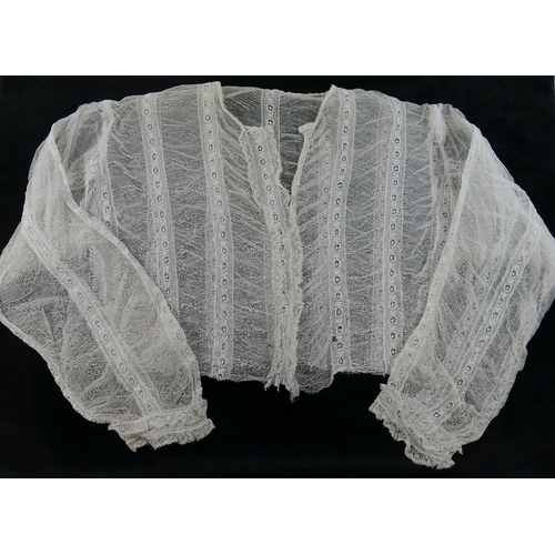 396 - 19th century lace ladies garments comprised of a full length over-skirt, two lace tops and a shawl (... 