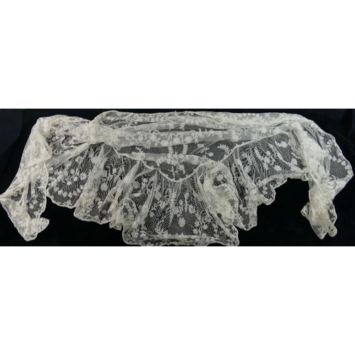 396 - 19th century lace ladies garments comprised of a full length over-skirt, two lace tops and a shawl (... 