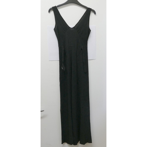 401 - A vintage full length black slip dress, a black sheer full length dress and one other vintage black ... 