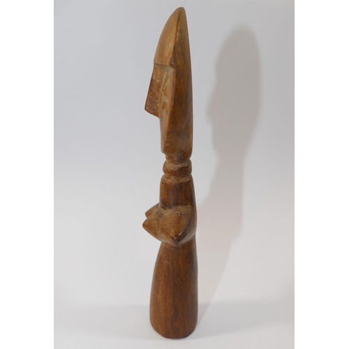 128 - An Ashanti carved wooden female fertility figure, 16.5cm high