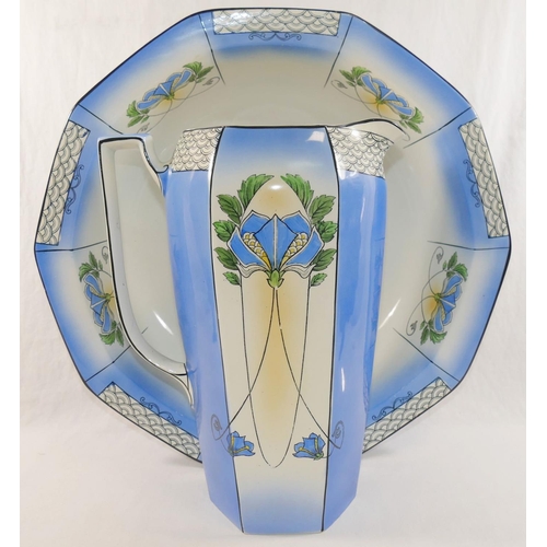 349 - An Art Nouveau wash jug and bowl, with floral transfer printed decoration and panelled sides, the ju... 