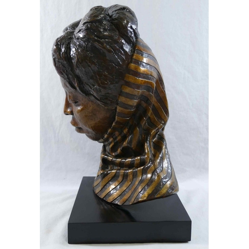 360 - A head study of an African lady wearing a scarf, bronze with gilt detail, on rectangular plinth, ini... 