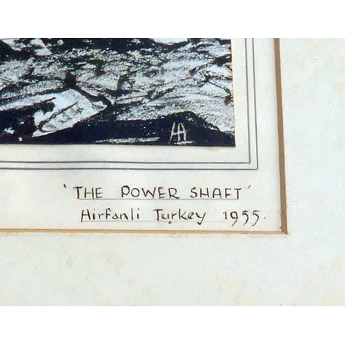 64 - A 1950's monochrome print entitled 'The Power Shaft, Hirfanli Turkey, 1955', with indistinct initial... 