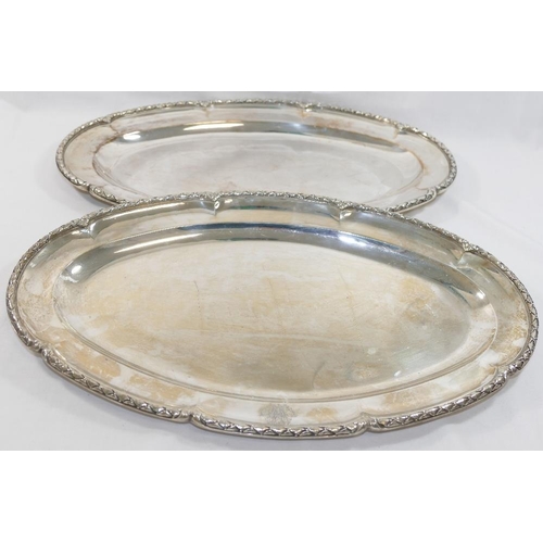 31 - A pair of French silver serving dishes, cast with ornate rim, bearing import marks for London 1939, ... 
