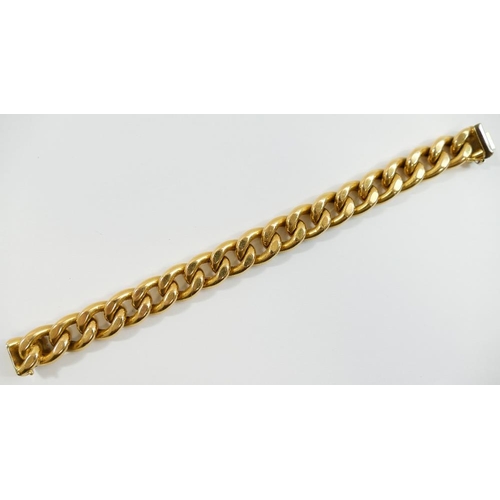 19 - An Italian hollow curb link bracelet, of large proportions, the links with slightly flattened sides,... 