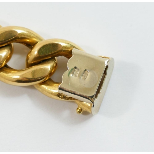 19 - An Italian hollow curb link bracelet, of large proportions, the links with slightly flattened sides,... 