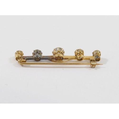 1 - A diamond five-stone bar brooch, the centre old-cut stone approximately 0.50 carats, the remaining s... 