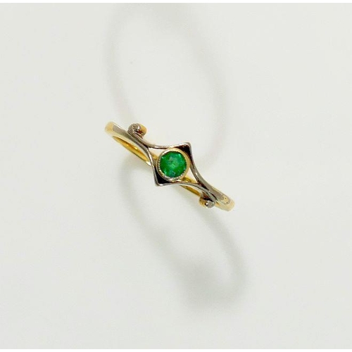 11A - An emerald single stone ring, the round mixed cut emerald, 4mm diameter, in millegrain setting, the ... 