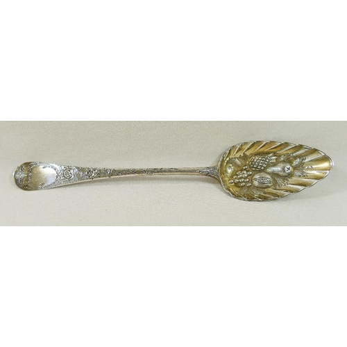 113 - A George III silver spoon, London 1796, later decorated and converted to a berry spoon, 23cm long, 2... 