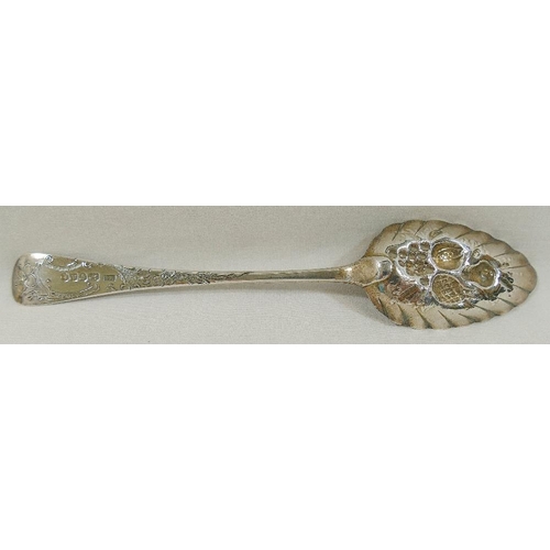 113 - A George III silver spoon, London 1796, later decorated and converted to a berry spoon, 23cm long, 2... 