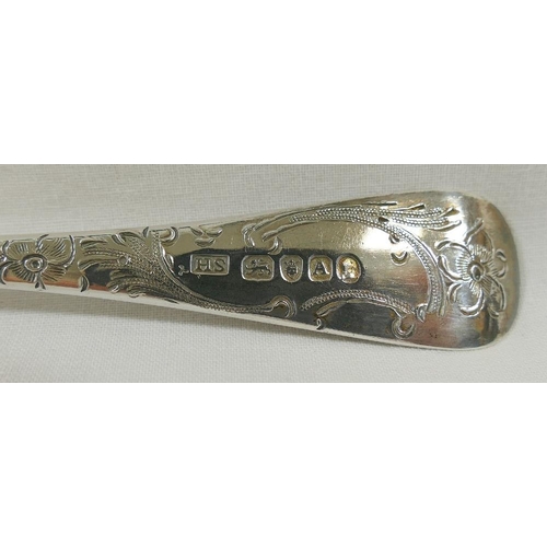 113 - A George III silver spoon, London 1796, later decorated and converted to a berry spoon, 23cm long, 2... 