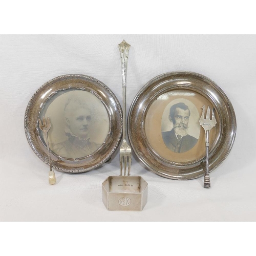 114 - A circular silver photograph frame, Birmingham 1919, with wooden back, 14.8cm diameter, another circ... 