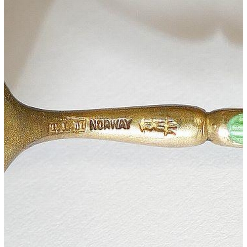 115 - A set of six Norwegian gilt and green enamel coffee spoons, stamped 'Norway' to the reverse and 'T.L... 