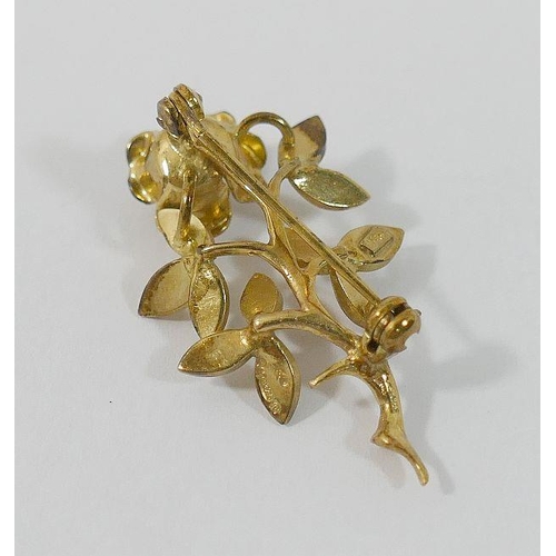 12A - A 9 carat gold single rose stem brooch, with import marks for London 1966, 3.3cm long, 3.8g