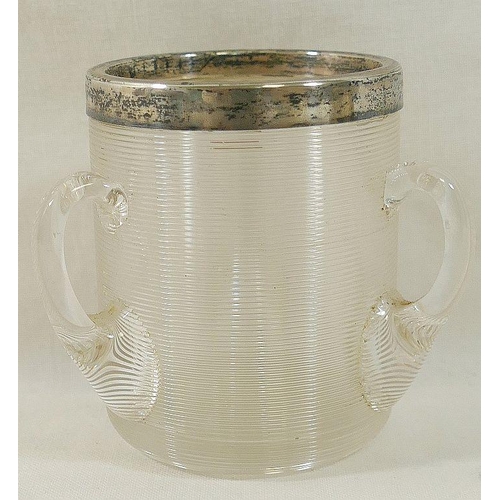 122 - An early 20th century silver-mounted glass hip flask, London 1913, 15cm high, and a three handled gl... 