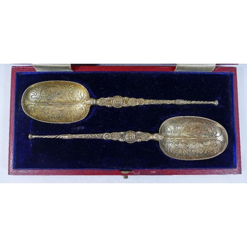 123 - A pair of silver gilt replica anointing spoons, London 1910, 17cm long, combined weight 2.51ozt, 76.... 