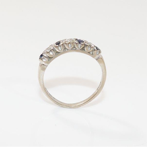 13A - An 18ct white gold sapphire and diamond half eternity ring, the four mixed cut sapphires intersperse... 