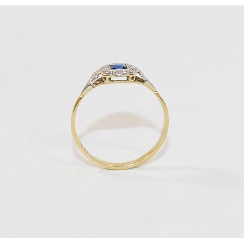 19 - An early 20th century sapphire and diamond ring, the white head of the ring set with square mixed cu... 