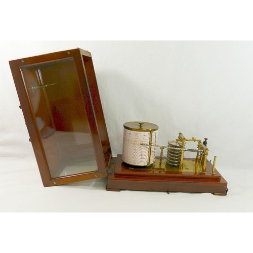 209 - A Wilson, Warden & Co barograph, numbered 2166, with seven vacuum sections and brass frame, housed i... 