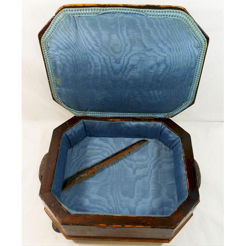 212 - A late Victorian crossbanded footstool/sewing box, the hinged blue velvet top opening to reveal a bl... 